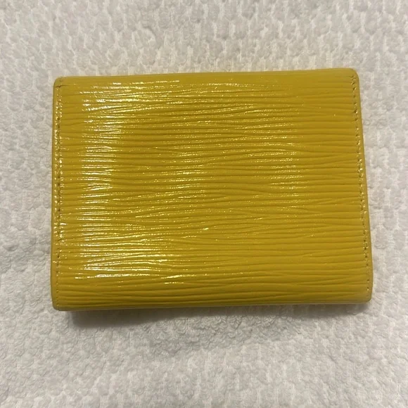 Louis Vuitton yellow coin case
